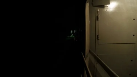 Night Train Departs From the Platform and Goes in the Night. Timelapse. Looped Stock Footage 69841174