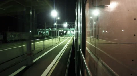 Night train departs from platform. Timelapse Stock Footage 63313667