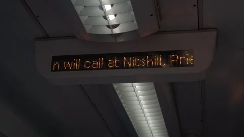 Night Train Digital Journey Information Sign in Urban Station Video stock 336923502