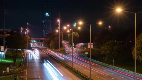 Night Transit Lines: Broad Highway by Munich Park Timelapse Stock Footage 309538919