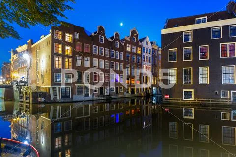 Night typical Dutch house, Amsterdam, Netherlands Stock Photos