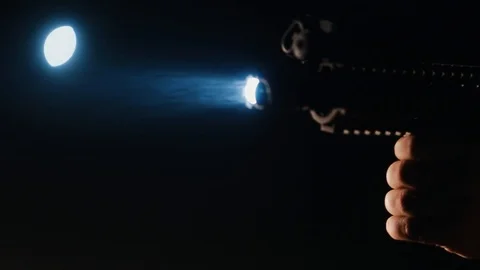 At night, an unknown person kills another with a gun Stock Footage 124778821