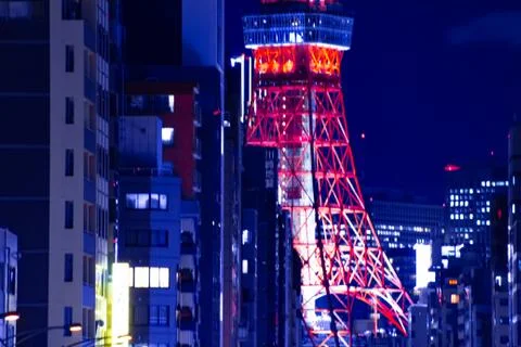 A night urban city street near Tokyo tower in Tokyo long shot Stock Photos