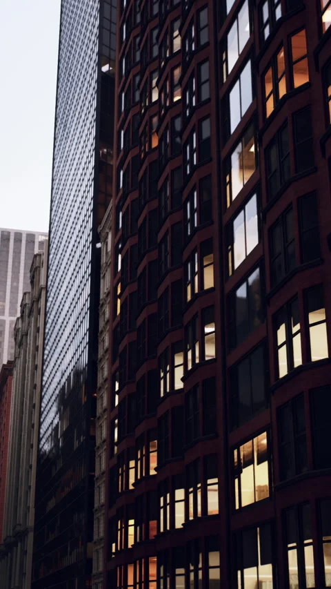 Night urban landscape featuring glowing windows and repeated arch shapes Stock Footage 329682670