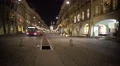 Night urban life in European city, bus driving to station along main street 4k or 4k+ Resolution