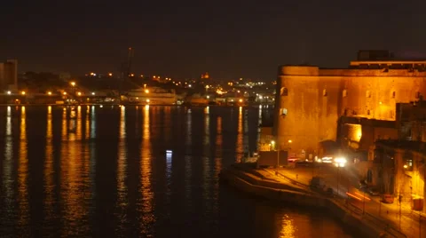 Night Valletta and port hyperlapse - boats and cars motion Stock Footage 63979337