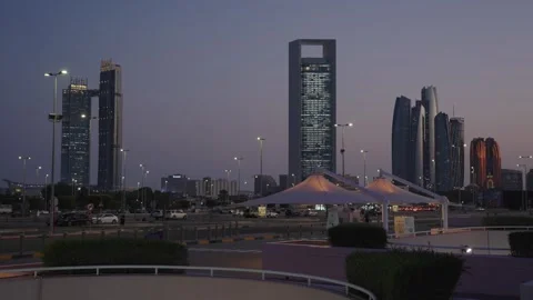 Night view of Abu Dhabi skyline with illuminated skyscrapers, traffic Vídeos de archivo 331342883