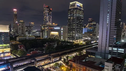 Night view of Bangkok BTS skytrain and cityscape high-rises Stock Footage 204073178
