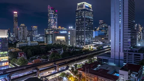 Night view of Bangkok BTS skytrain and cityscape high-rises Stock Footage 204074111