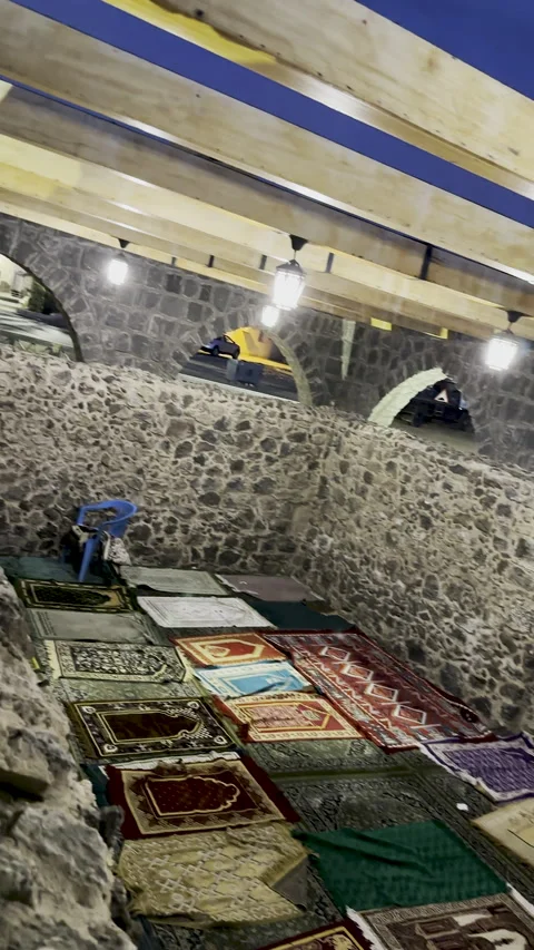 Night View of Bani Anif Mosque And Prayer Rugs Stock Footage 331889264