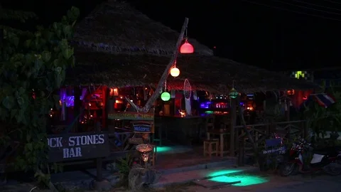 Night view of a bar on Koh Lipe island at night, Thailand. Stock Footage 83214328