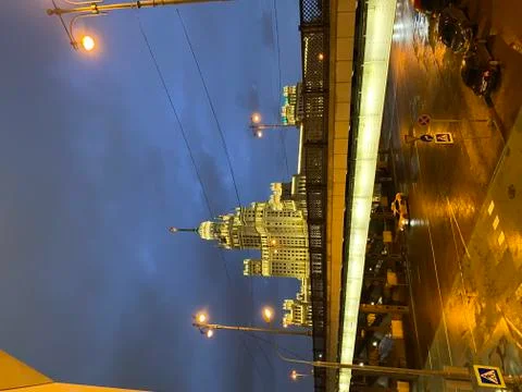 Night view on a bridge and a Stalinistic style skyscraper, Moscow Stock Photos