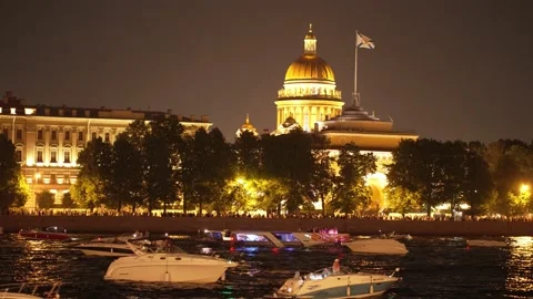Night view from the bridge to a beautiful cathedral and yachts, boats Stock Footage 235182101