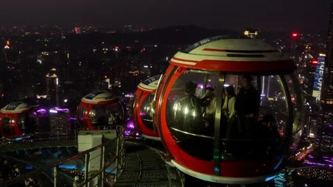 Night view from Bubble Tram car on top of Canton Tower, after sunset,4K Video stock 303251032