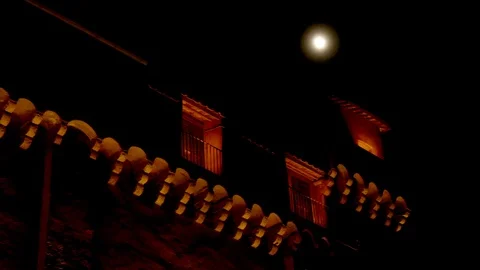 Night view of a castle with the moon - Pan Stock Footage 90298736