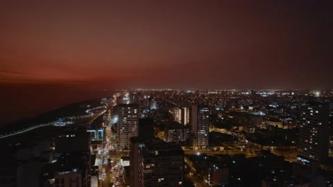 Night view of the city of Lima in the municipality of San Miguel. Stock Footage 228826663