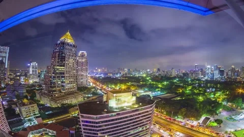 Night View of City Skyline with Dramatic Clouds and Fisheye Lens Effect Stock Footage 310216293
