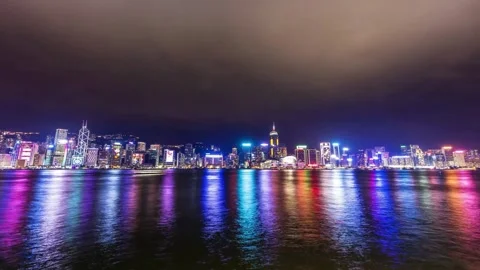 Night View of City Skyline Reflected in Water Stock Footage 310325437