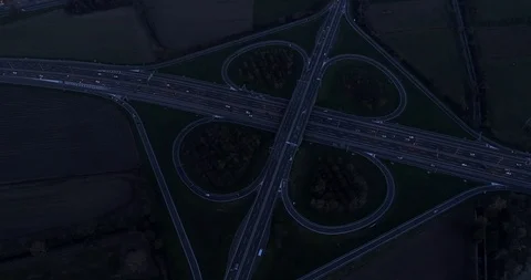 Night view of cloverleaf interchange Stock Footage 98597867