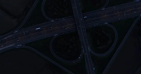 Night view of cloverleaf interchange Stock Footage 98597949