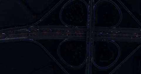 Night view of cloverleaf interchange Stock Footage 98598036