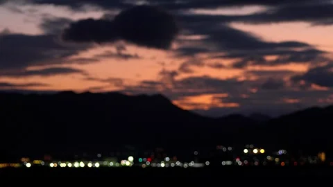 Night View Copy Space Blurred Lights and Purple Sunset Sky Coastline,4K Stock Footage 345267713