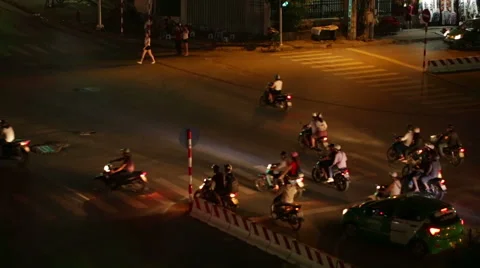 Night view of a crossroad with traffic light in Hanoi, Vietnam Stock Footage 67176009