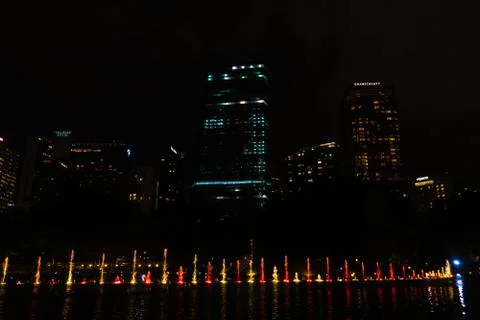 Night view of the dancing multi-colored fountains. Show of Singing Fountains Stock Photos