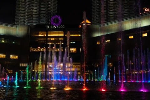 Night view of the dancing multi-colored fountains. Show of Singing Fountains Stock Photos