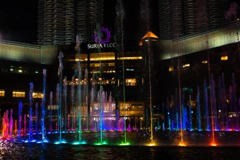 Night view of the dancing multi-colored fountains. Show of Singing Fountains Stock Photos