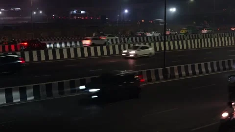 The night view of Delhi's bustling traffic is a spectacle of vibrant lights Stock-Footage 255115271