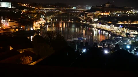 Night view on Douro river and the Dom Luís I Bridge in Porto, Portugal Stock Footage 165693641