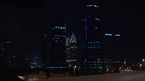 Night view of Dubai skyscrapers Stock Footage 76596381