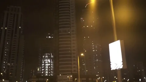 Night view of Dubai skyscrapers Stock Footage 76596442