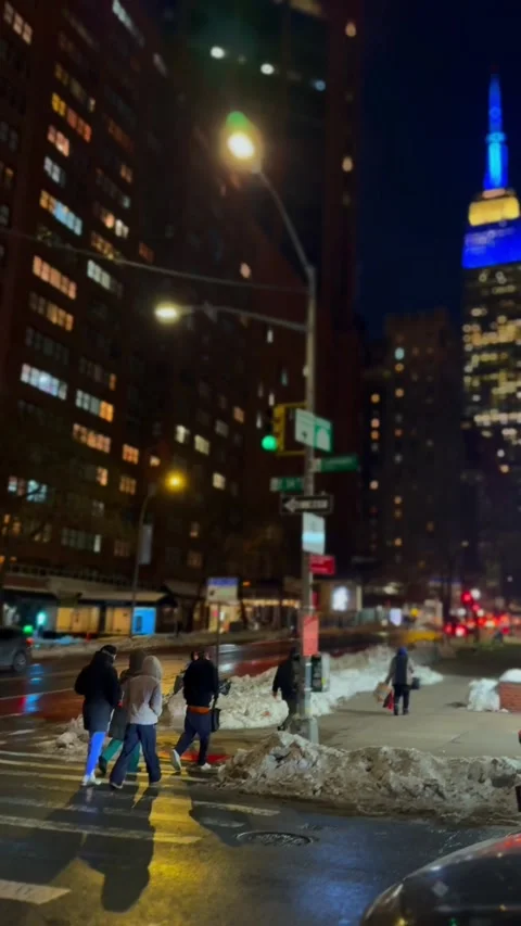 Night View of Empire State Building from 34th St, Winter Snow, NYC Stock Footage 328064211