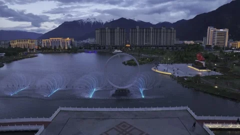 The night view of  Ethnic Unity Square in Bayi District, Nyingchi City, Tibet Stock Footage 306865073