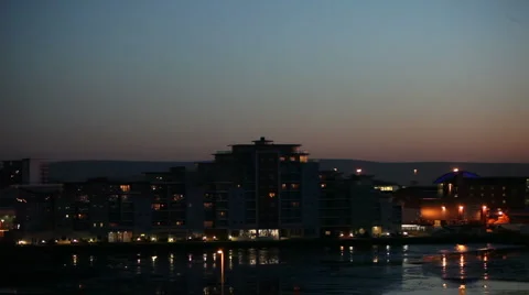 Night view of flat by the water 9901 Stock Footage 4118950