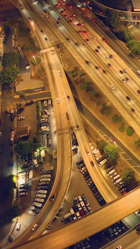 Night view of freeway interchange in downtown Los Angeles with light trails Video stock 318734877