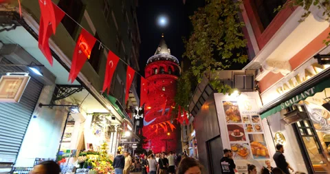 Night view of Galata tower colored with red to celebrate centenary of republic Stock Footage 318683316