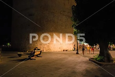 Night view of the historic center with the bustling city life of the city of Stock Photos