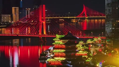 Night View of Illuminated Cable Stayed Bridge and Traditional Architecture China Stockbeeldmateriaal 347186184