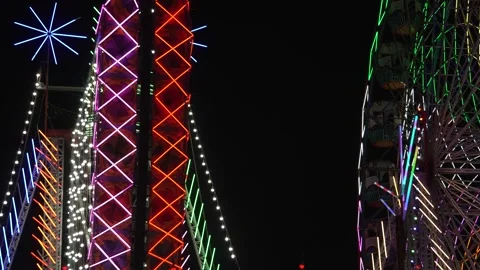 Night View of Illuminated Ferris Wheel at Indian Mela Stock Footage 318769285