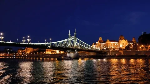 Night View Of The Illuminated Freedom Bridge And The Embankment Of Budapest Stock Footage 103195410