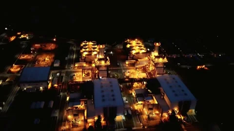 Night View of Illuminated Industrial Complex from Aerial Perspective 動画素材 310990875