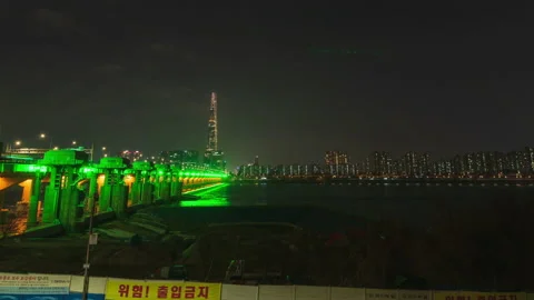 Night view of Jamsil bridge, skyscraper and Han River in Seoul South  Korea Stock Footage 233023455