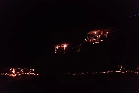 Night view of lighted house Stock Photos