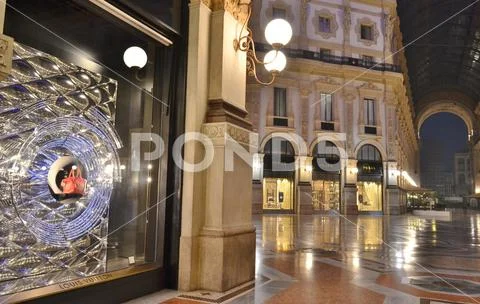 Night view to Louis Vitton boutique in the Vittorio Emanuele II Gallery in Milan Stock Photos
