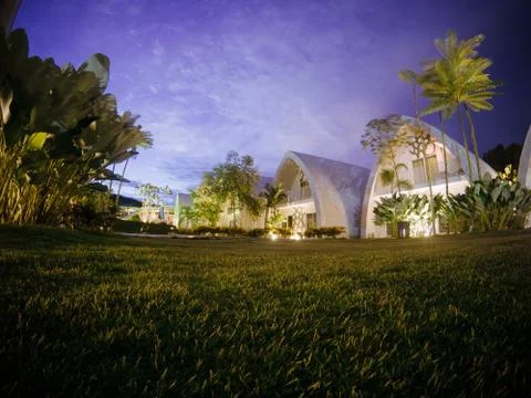 Night view at low angle of chic and street art hotel building (dash box) 写真素材