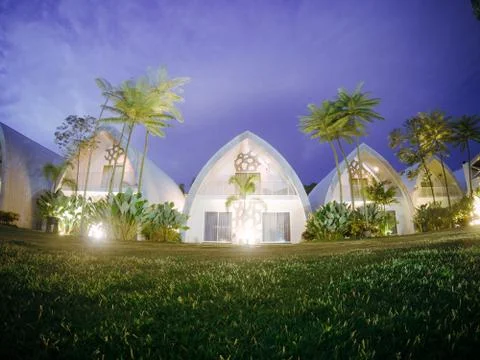 Night view at low angle of chic and street art hotel building (dash box) 写真素材