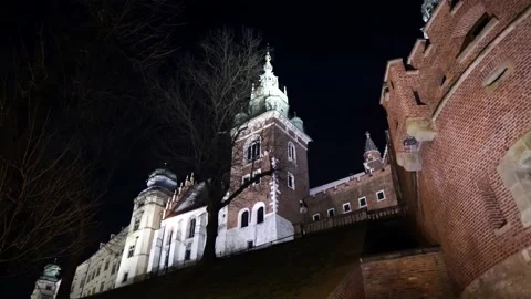 Night view of the medieval royal castle and museum in Krakow, Poland Stock Footage 145165494